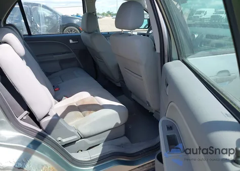 2005 Ford Freestyle Se из США, поврежденный, VIN 1FMDK01145GA06509